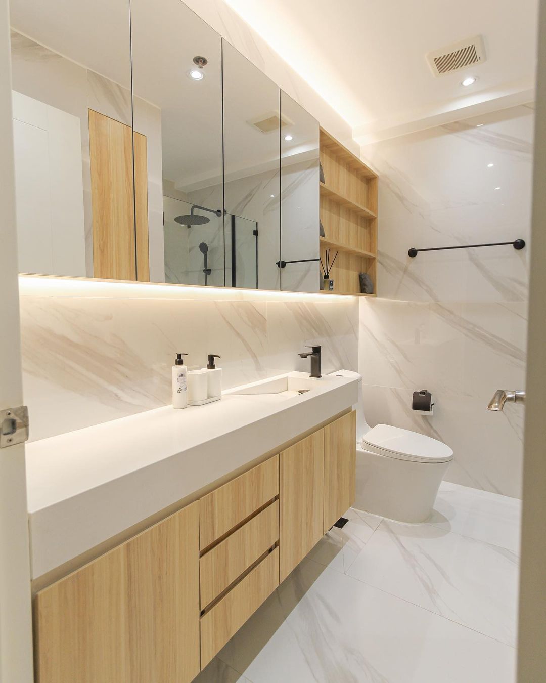 wooden cabinets in a bathroom