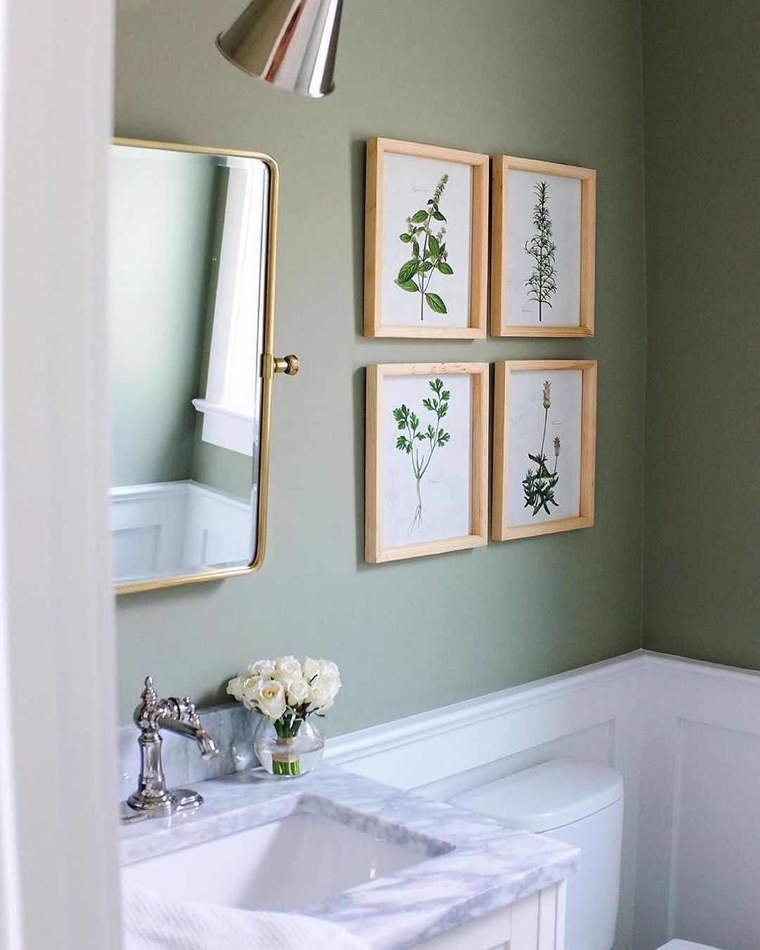 bathroom with pictures