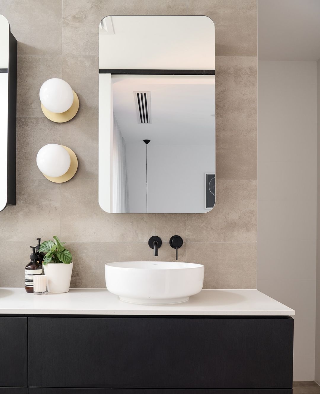 bold accents in a bathroom with a cabinet