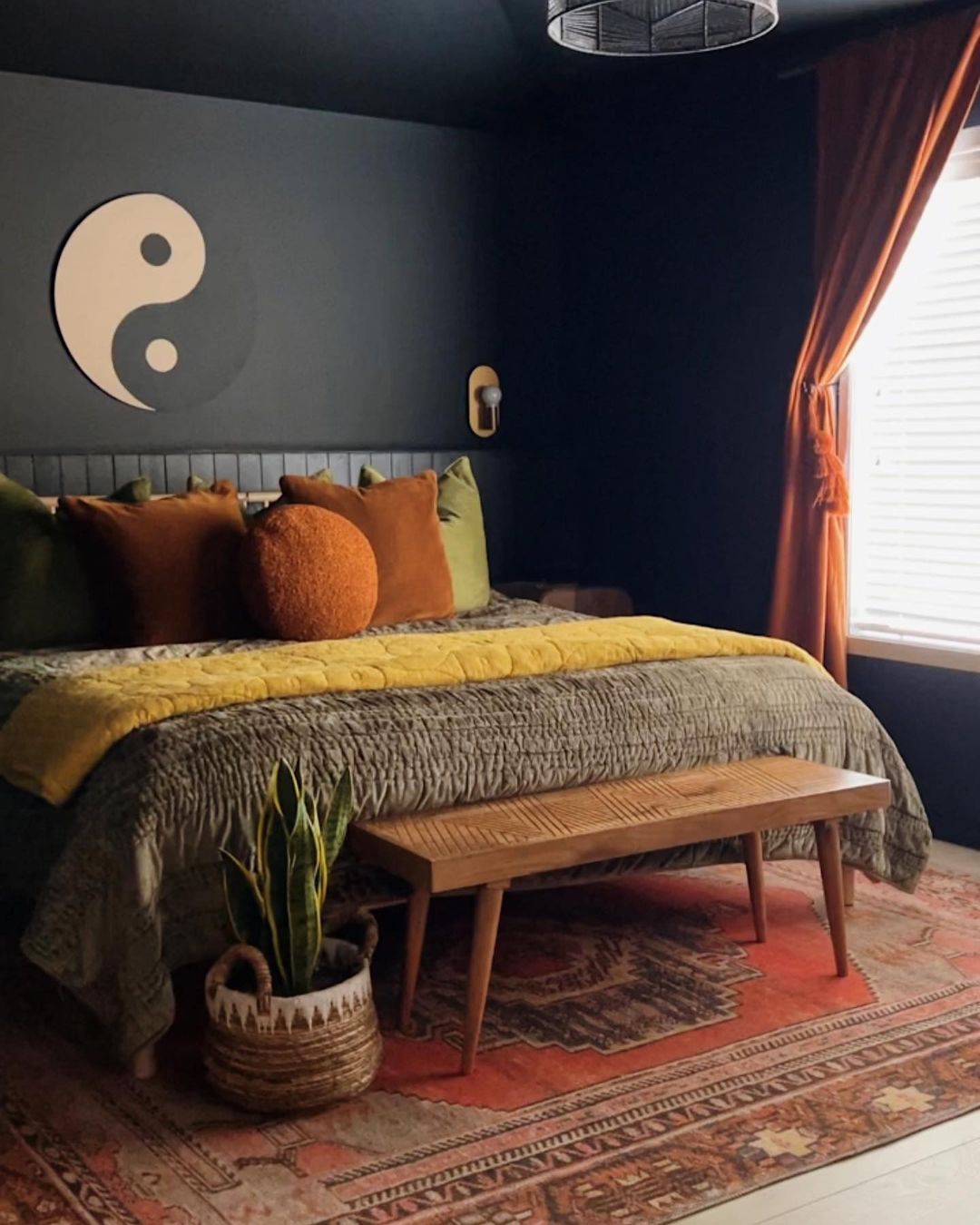 mid century modern bedroom with yellow and rust