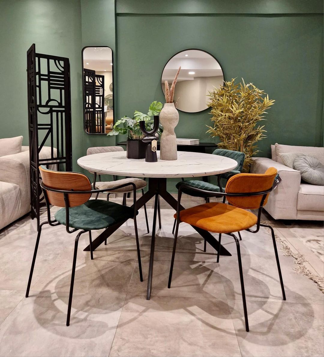 mid century modern dining area with green color scheme